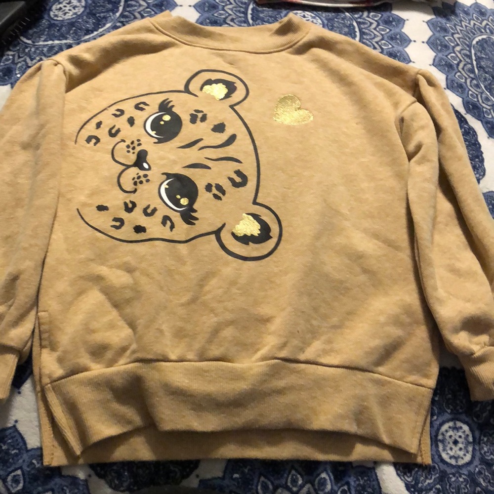 Tan Cheetah sweater never worn